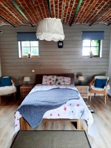 Postel nebo postele na pokoji v ubytování Gîte de l'Espinette