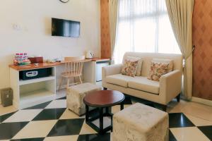 TV a/nebo společenská místnost v ubytování HOME Guesthouse