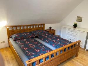 Ein Bett oder Betten in einem Zimmer der Unterkunft Sunside Apartments Gästehaus