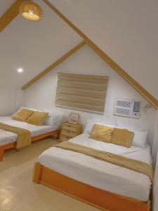 Katil atau katil-katil dalam bilik di Ridge Grove private resthouse