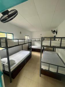 Ένα ή περισσότερα κρεβάτια σε δωμάτιο στο Olive Mirissa