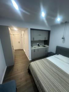 Letto o letti in una camera di Alliance Palace By Marriott