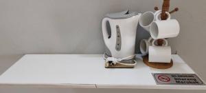 a pretend kitchen counter with a pretend blender and a box at Tamu Chalet Cherating in Kuantan