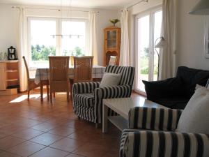 Posezení v ubytování Ferienhaus Seeblick 39