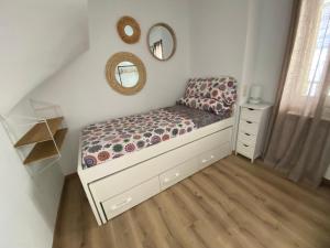 Postel nebo postele na pokoji v ubytování Casa Cris Encamp