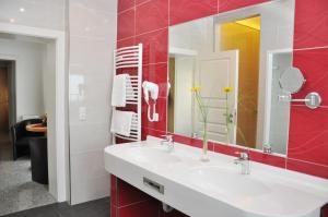 Koupelna v ubytování Garni Hotel Alber