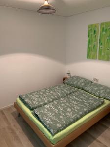 Postel nebo postele na pokoji v ubytování Ferienwohnung Altstadtblick