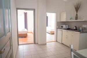 Kuchyňa alebo kuchynka v ubytovaní Amenity Apartmány Perná
