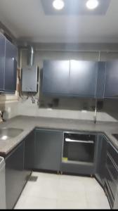 Kuchyň nebo kuchyňský kout v ubytování شقة فندقية + 7 fotografií