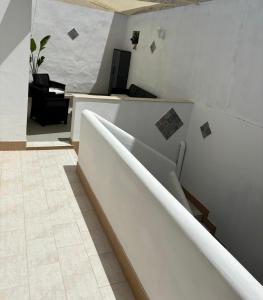 a set of stairs in a room at Matteotti in Mazara del Vallo
