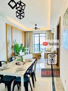 Posezení v ubytování R&F PRINCESS COVE BY HOMEFORT SUITES