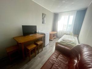 TV a/nebo společenská místnost v ubytování Riverside Motel Jelgava