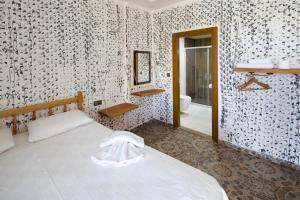 Ein Bett oder Betten in einem Zimmer der Unterkunft Adrasan Kayaköy Villaları