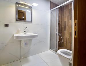 Ein Badezimmer in der Unterkunft Adrasan Kayaköy Villaları