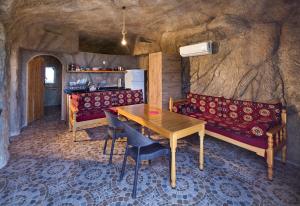 Ein Sitzbereich in der Unterkunft Adrasan Kayaköy Villaları