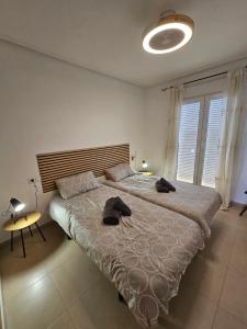 Postel nebo postele na pokoji v ubytování 2 chambres à coucher à Sucina