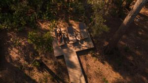 an overhead view of a picnic table in a forest at Domaine De Manville in Les Baux-de-Provence