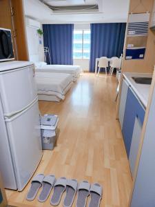 Kuchyň nebo kuchyňský kout v ubytování Hongdae Cleanhouse