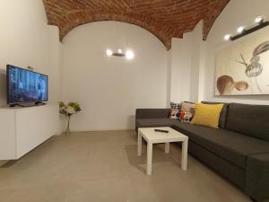 Et opholdsområde på Art & Cozy Apartments