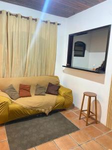 TV a/nebo společenská místnost v ubytování Aconchego - Casinha no Centro de Arraial do Cabo