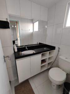 Phòng tắm tại Aquarius Residence seu lugar na praia de Iracema