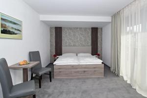 Postel nebo postele na pokoji v ubytování Guest House Frizzante