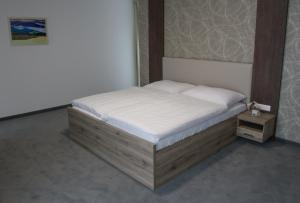 Postel nebo postele na pokoji v ubytování Guest House Frizzante