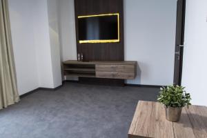 TV a/nebo společenská místnost v ubytování Guest House Frizzante