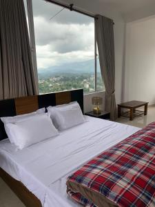 Letto o letti in una camera di Galkaduwa360 Villa