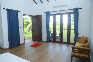 Ένα ή περισσότερα κρεβάτια σε δωμάτιο στο Villa Green Paradise