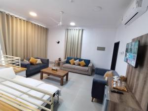 Postel nebo postele na pokoji v ubytování ALOEVERA VILLAS & CAFA + 24 fotografií