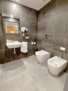 Phòng tắm tại Hotel Vitruvio
