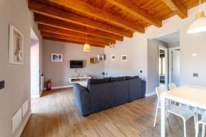 a living room with a couch and a table at Hotel Rural SOL in Piedrahita de Castro