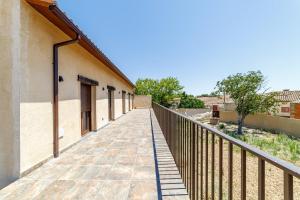 a walkway leading up to a building at Hotel Rural SOL in Piedrahita de Castro