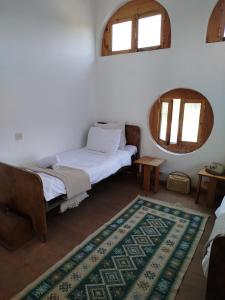 Letto o letti in una camera di Gremeli Wine & Hotel
