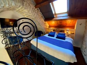 B&B Maison des Etoiles Chambre d'hôtes Adult Only客房内的一张或多张床位