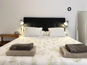 Postel nebo postele na pokoji v ubytování Cosy apartment in Arrecife centre Casa Sol