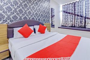 Postel nebo postele na pokoji v ubytování Hotel New Shiv INN