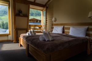 Una cama o camas en una habitación de Hotel Old Seti