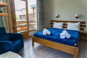 Una cama o camas en una habitación de Hotel Old Seti