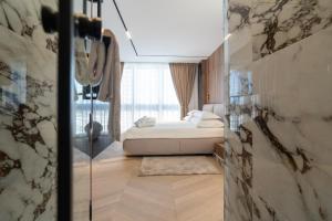 Ein Bett oder Betten in einem Zimmer der Unterkunft Luxury Rooms - FOR GIFT