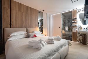 Ein Bett oder Betten in einem Zimmer der Unterkunft Luxury Rooms - FOR GIFT