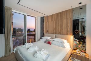 Ein Bett oder Betten in einem Zimmer der Unterkunft Luxury Rooms - FOR GIFT