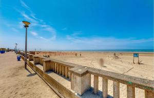 a view of a beach with people on it at Seaside Studio in Cucq