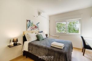 Postel nebo postele na pokoji v ubytování Apto aconchegante bem localizado em POA - RFA303