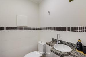 Koupelna v ubytování Apto aconchegante bem localizado em POA - RFA303 + 10 fotografií