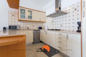 Η κουζίνα ή μικρή κουζίνα στο #134 Vila Dias 2 by Home Holidays
