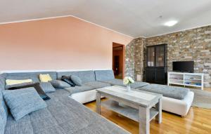 a living room with a couch and a table at Villa Kaja in Jastrebarsko