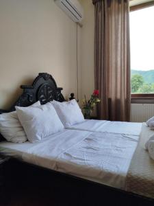 Letto o letti in una camera di Gremeli Wine & Hotel