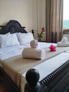 Postel nebo postele na pokoji v ubytování Gremeli Wine & Hotel